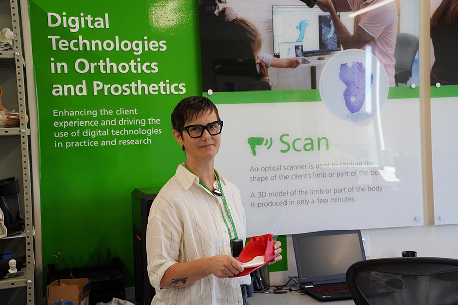 An adult standing in a lab