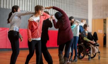 Clients stretching in a gym