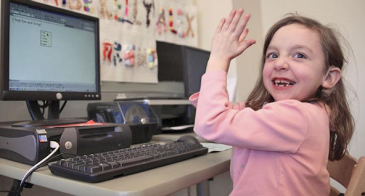 A girl in front of computer