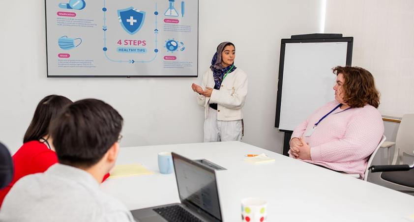 A group of people in a training class
