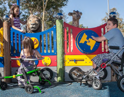Image of children playing around play walls