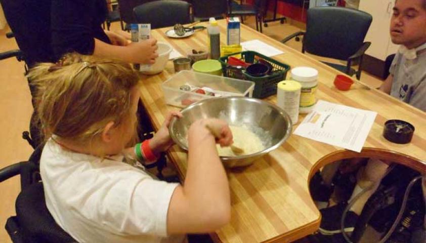 Group baking is one of the many fun activities available in the day program