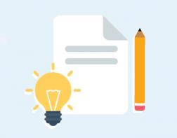 pencil and paper with lightbulb