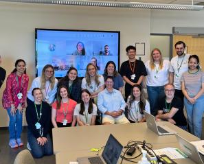 group of clinicians in a room smiling