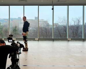 A person wearing some detection devices and a camera is filming towards that person