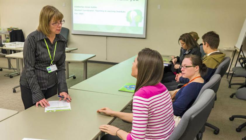 Teacher interacting with students