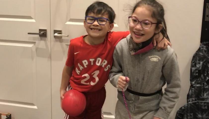 Bella and Petie playing basketball.