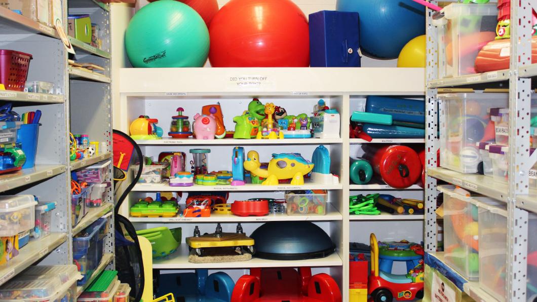 A toy-filled storage room. 