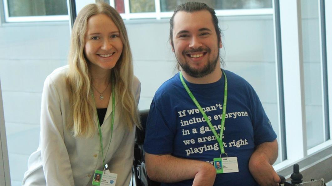 Close up of young woman and young man in wheelchair