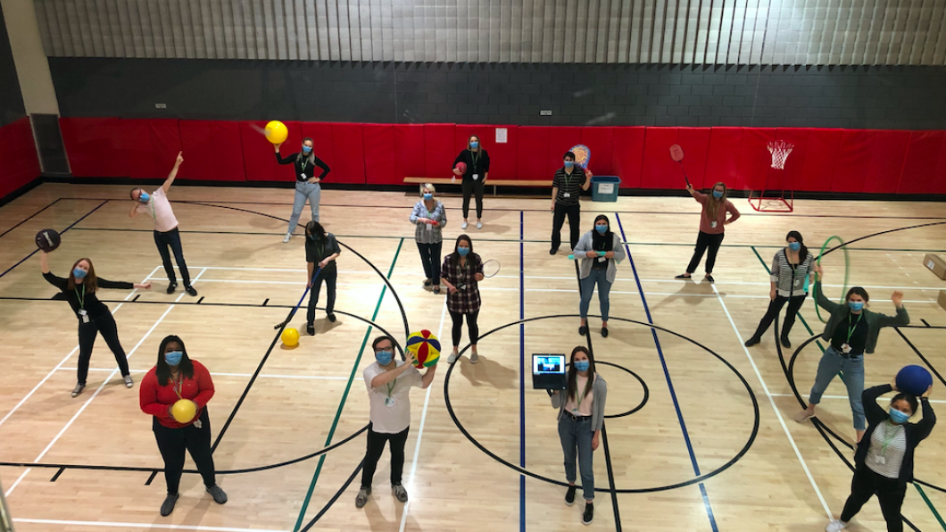 The team exercising social distancing while in the gym.