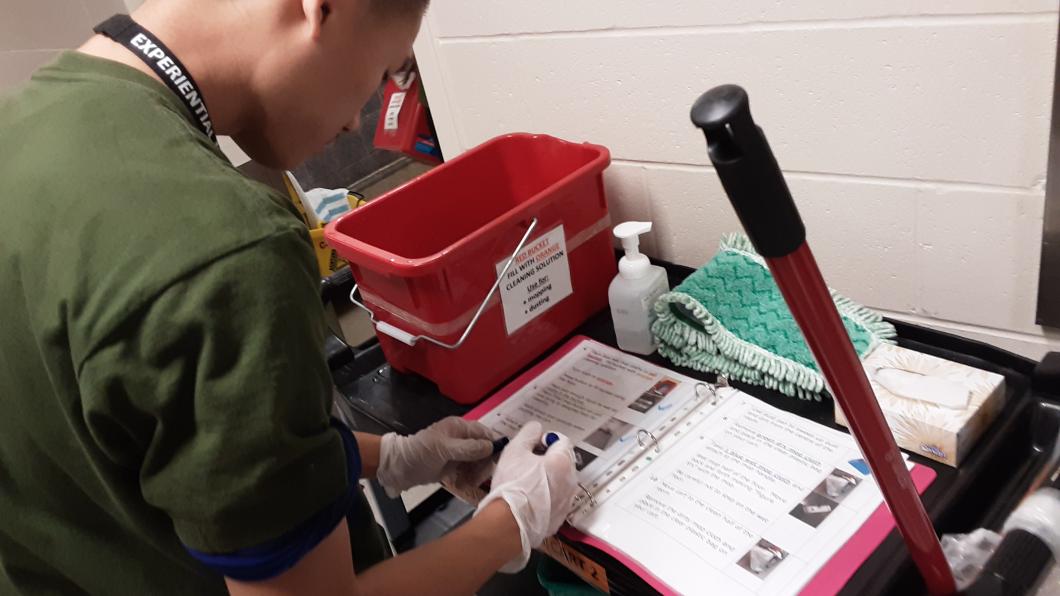 Student looking over the checklist.
