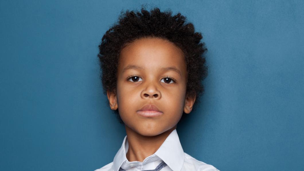 Black boy with blank expression